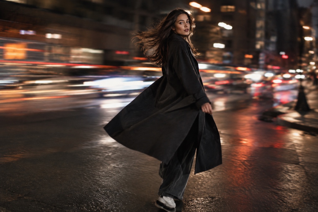 Side-by-side of an uploaded portrait photo and the resulting 12-second vertical clip showing the same person performing the hero point